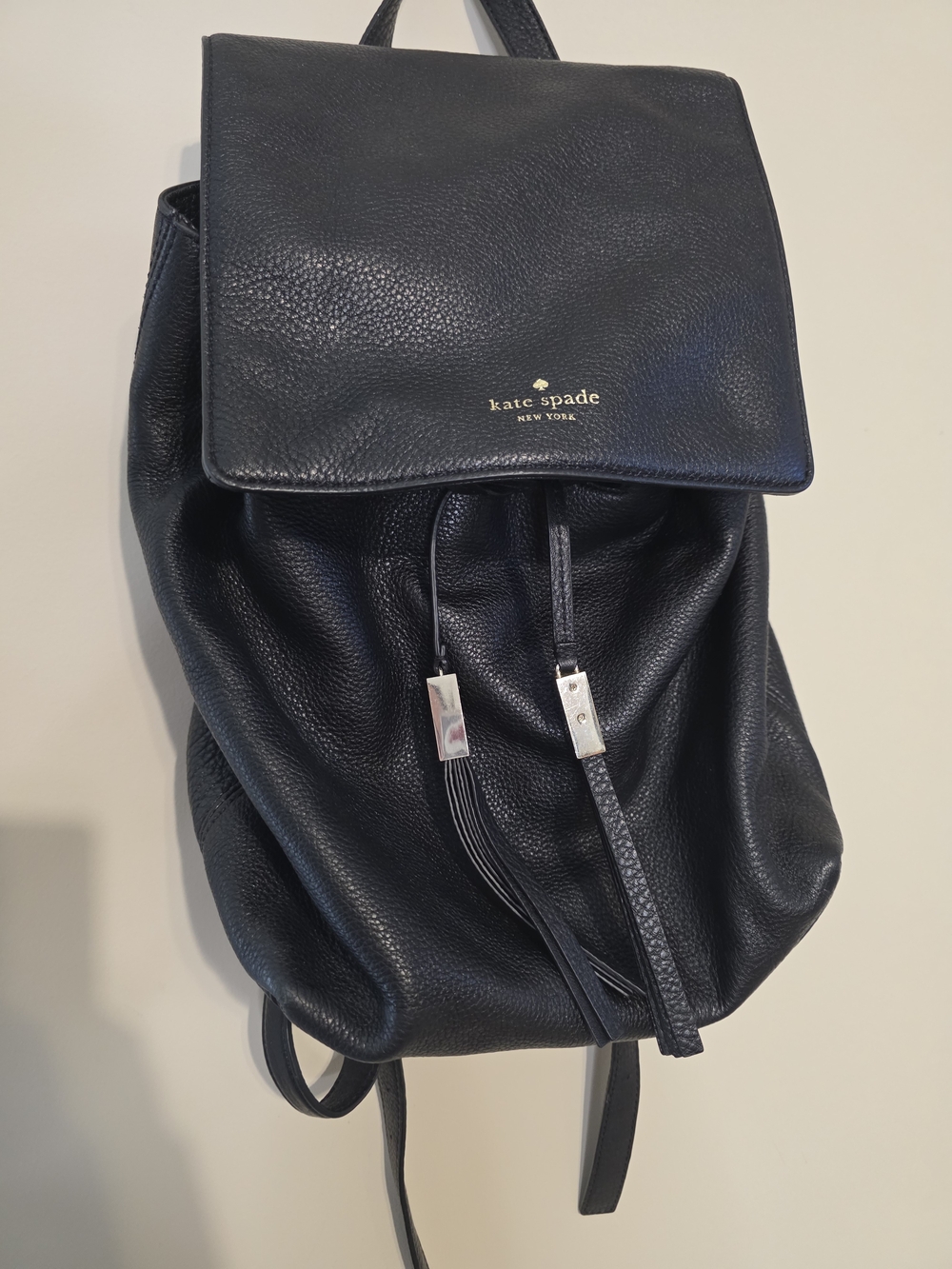 kate spade Black Pebbled Leather Backpack with Gold Logo